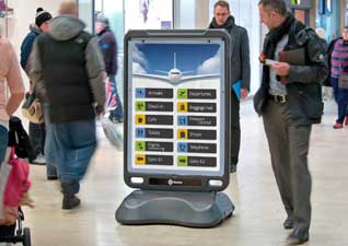 Advocate™ Floor Standing Poster Display Sign with airport flight timetable on large display area