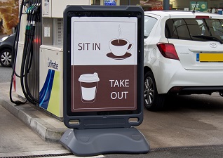 Advocate™ Poster Display Sign with sin it or take out poster sited next to petrol pumps