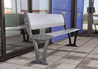 Alturo™ Seat in silver metal finish with backrest outside modern building