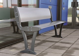 Alturo™ Seat with backrest in a contemporary, metal finish next to office building