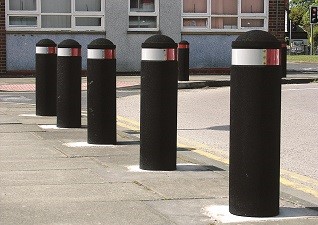 Buffer™ Bollard with flexible materials in black with white/red banding
