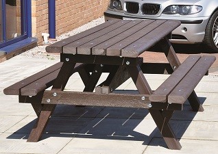 Clifton™ Recycled Material Picnic Table brown Enviropol slats for outdoor seating on paved floor