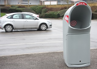 Combo Delta™ Large Aperture Litter Bin in grey with target sticker and thank you sign sited in car park