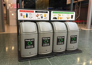 Combo™ Recycling Bins, set of 4 recycling station on recycling stand in middle of motorway services