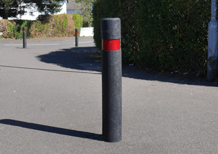 Enviropol™ bollard in black on school pathway made from recycled material