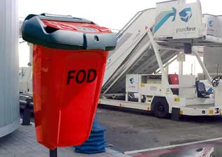 FOD 50 Bin in red next to plane stairlift