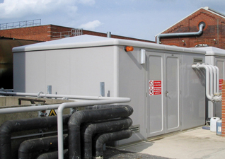 Garrison™ GRP Modular Housing for electrical enclosure with pipework leading from cabinet to main building