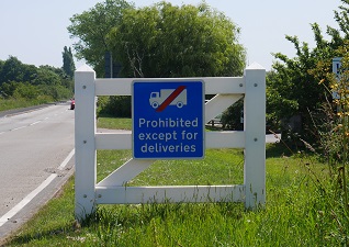 Glasdon Gateway Boundary Signage in white with prohibited except for deliveries blue poster
