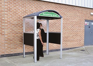 Modus™ Smoking Shelter with green smoking area sign and 2 smokers inside