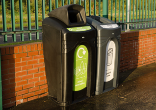 Nexus® 140 City outdoor recycling containers for general waste and mixed recyclables by wall