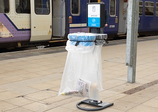 TSU™ Sack Holder for general waste and paper with clear sacks on train station platform