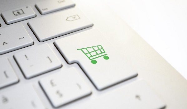 Image of keyboard and shopping cart for online shopping FAQs - Glasdon